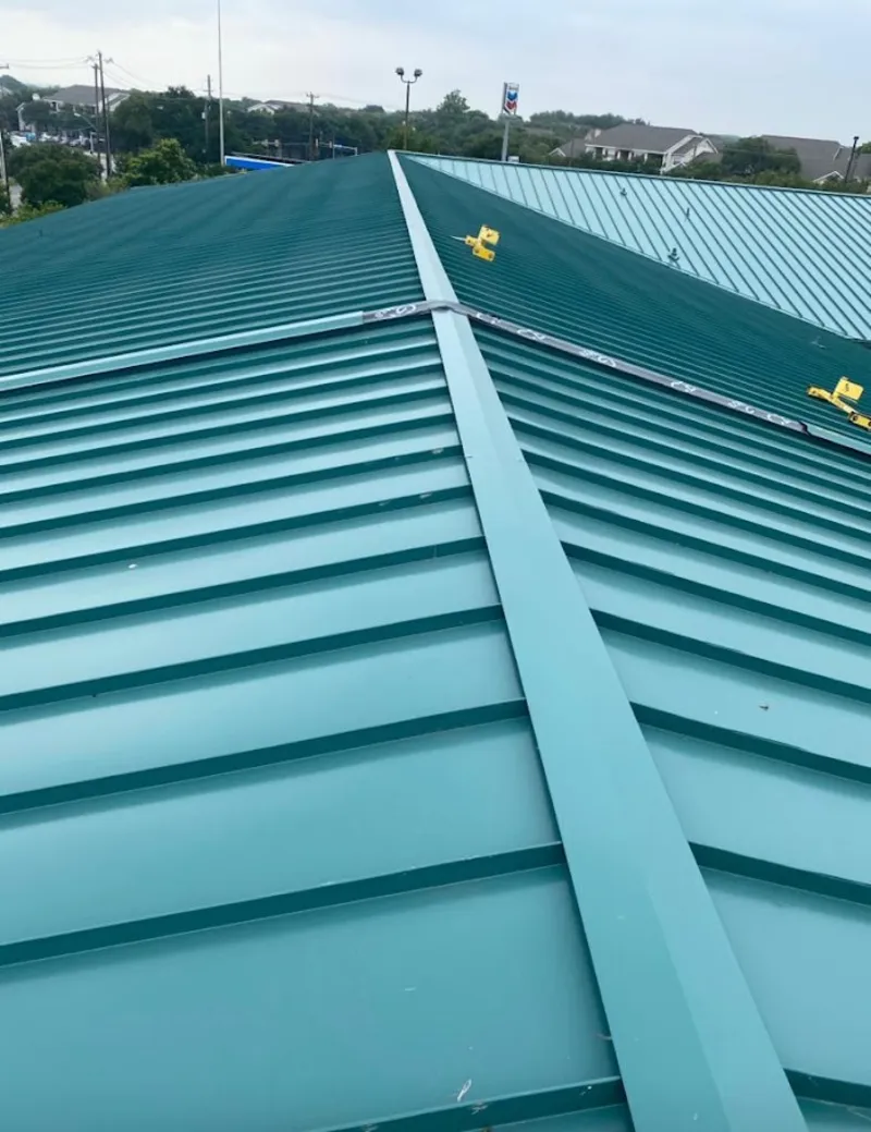 Green commercial metal roof ridge and valley for Metal Roof Repair in Chevy Chase